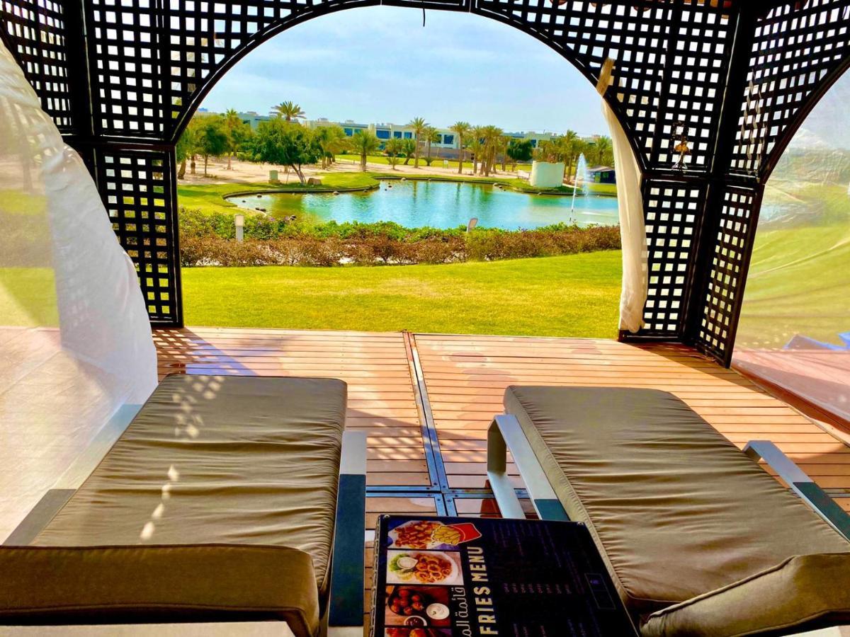 Retaj Salwa Resort & Spa Doha Exteriör bild View of the golf course at the Four Seasons Resort Scottsdale
