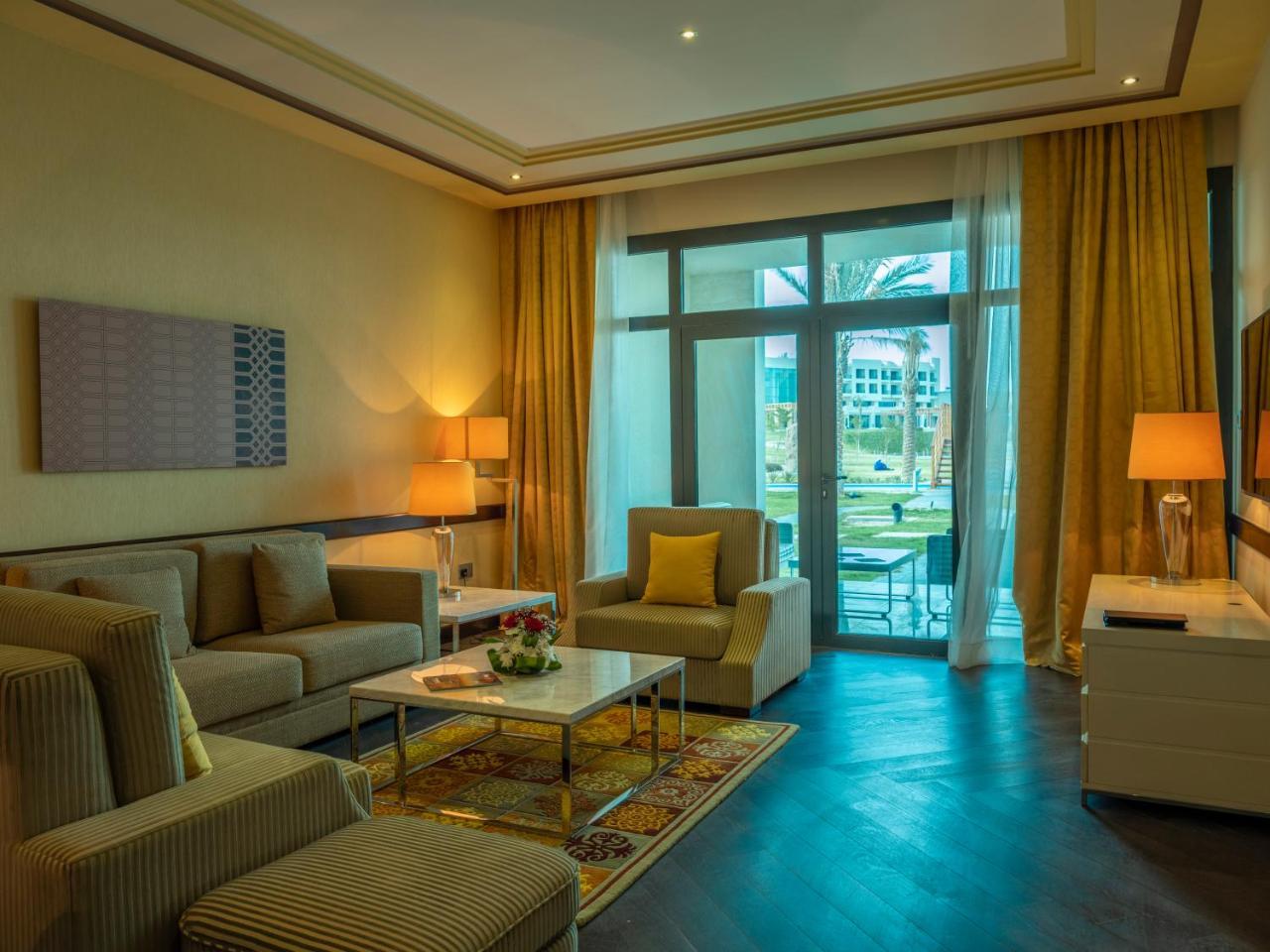 Retaj Salwa Resort & Spa Doha Exteriör bild A living room at the hotel